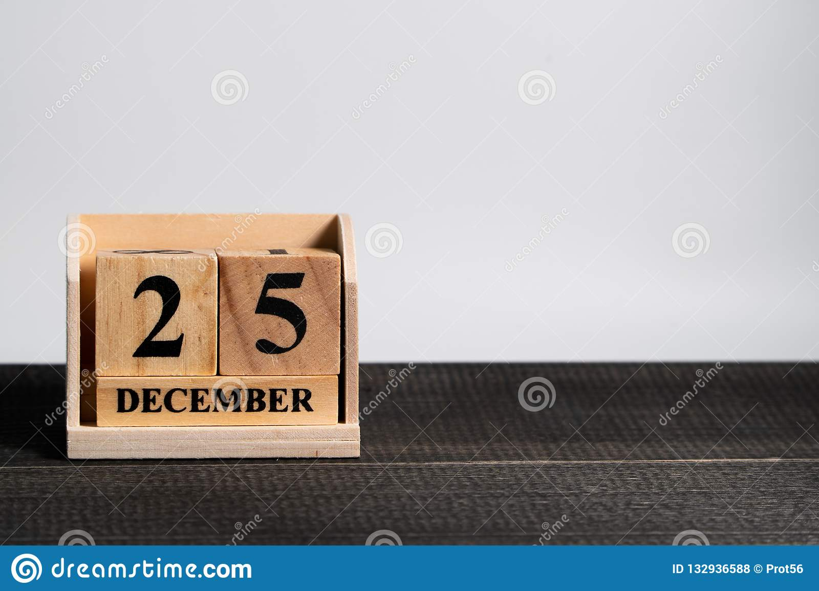 Wooden Block Calendar Set On The Christmas Date 25